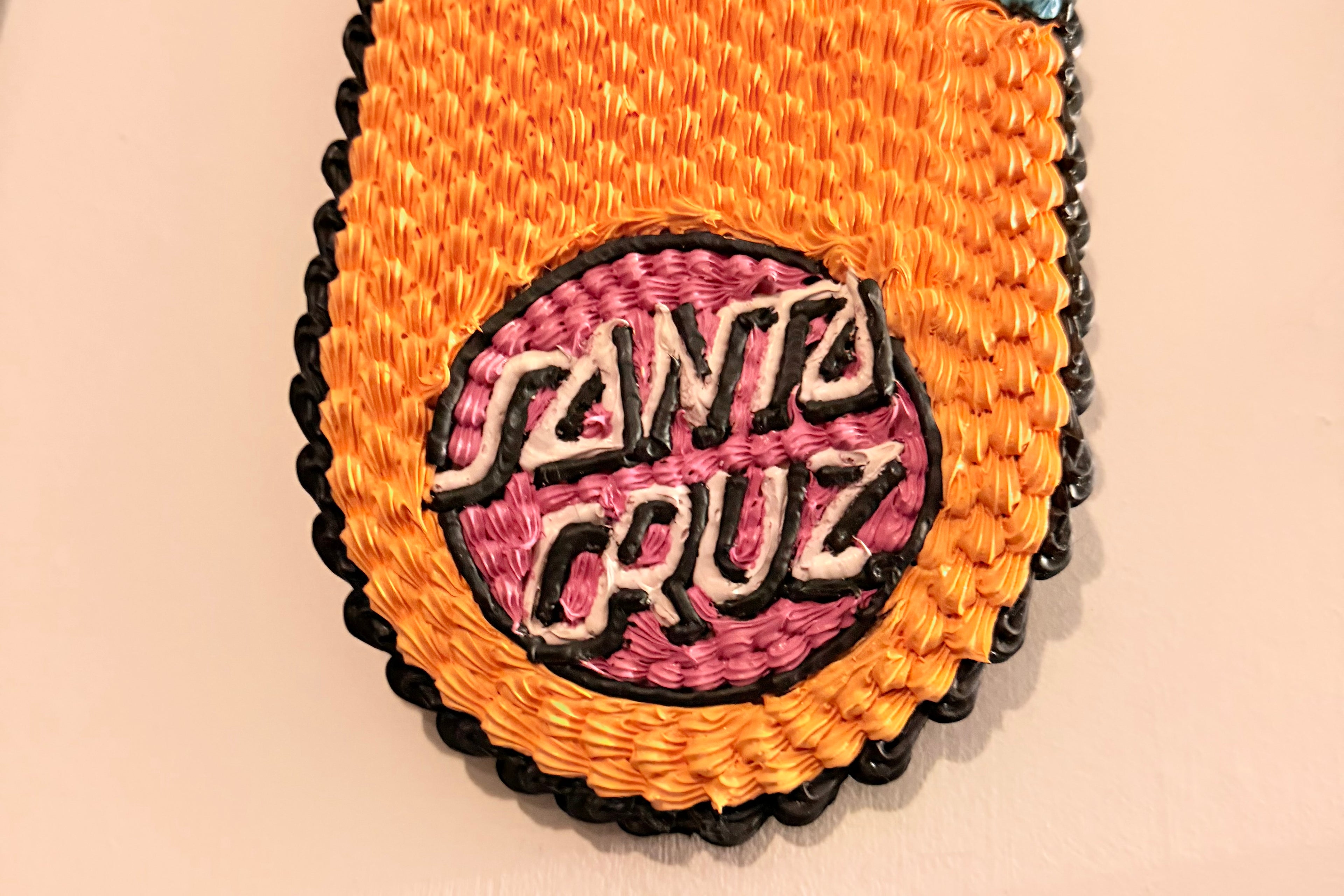 Santa Cruz Screaming Hand Orange Scakeboard hand piped